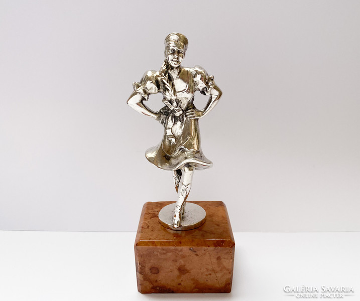 Old silver figure of a folk dancer on a marble base, marked.