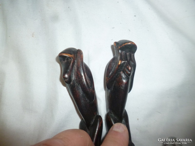 Pair of carved wooden monkey figurines