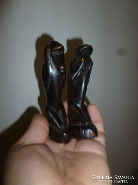 Pair of carved wooden monkey figurines