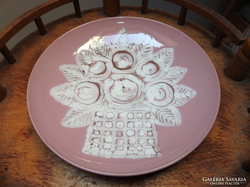 Large pink wall plate - marked - flower in a vase with a motif