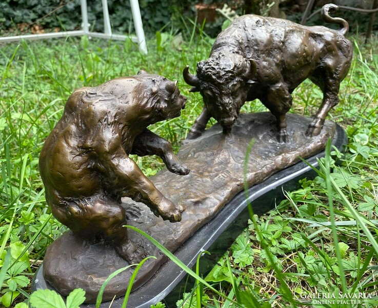 Bison and bear before fight - monumental bronze sculpture artwork