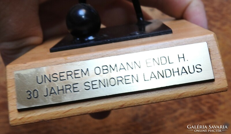Unserem obmann endl h. 30. Jahre senioren landhaus metal football figure on a wooden base