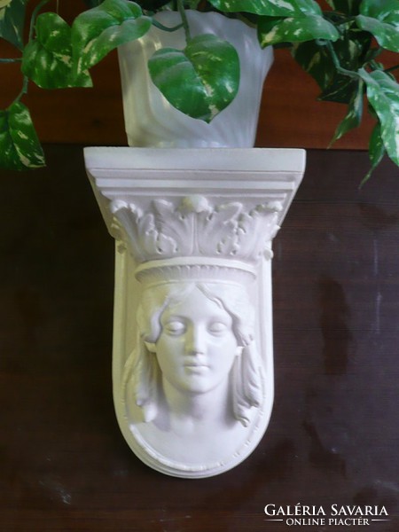 Wall bracket made of artificial marble