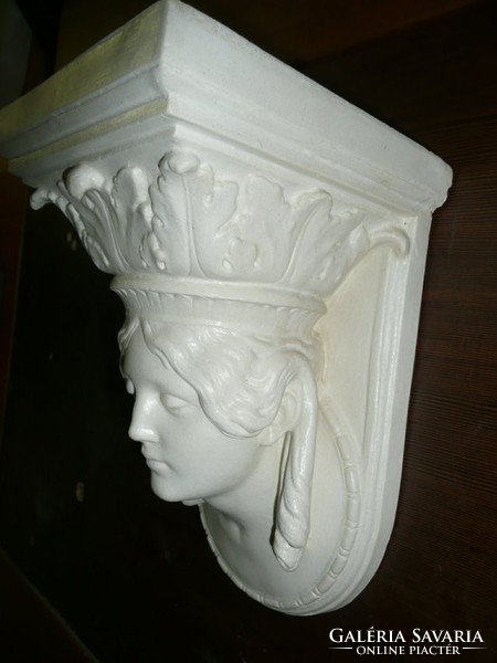 Wall bracket made of artificial marble