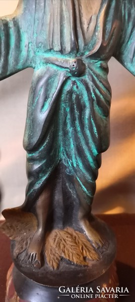 Dt/112 - Eastern water barrel, bronzed spaiater statue