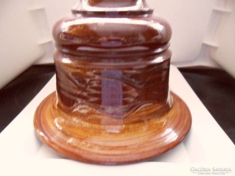 Artistic, shiny, brown, bell-shaped caspo