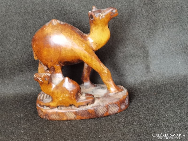 Old hand carved hardwood camel and calf carving