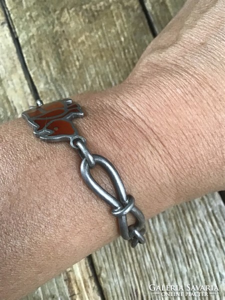 Old silver bracelet with rhinoceros decorated with fire enamel