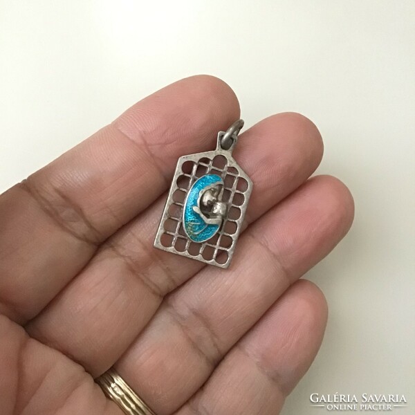 Old silver pendant with fire enamel decoration