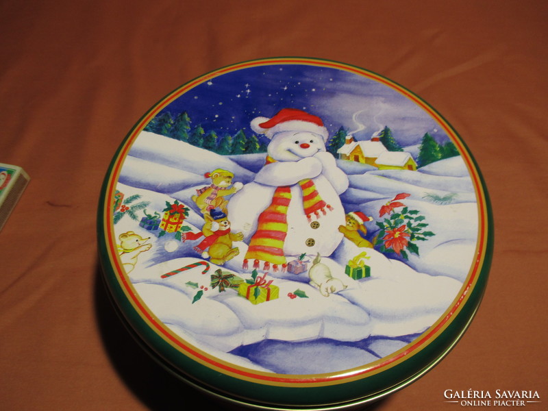 Metal box with Christmas cookies with a snowman pattern