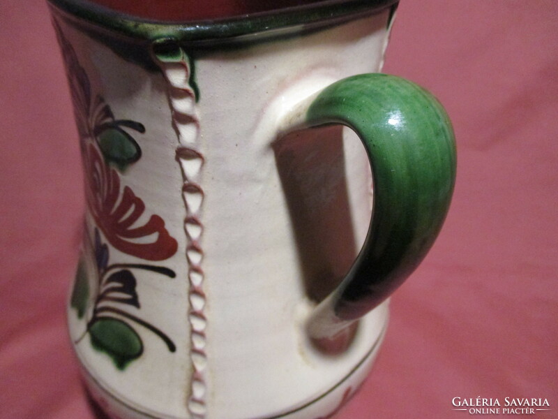 Ceramic vase with a handle