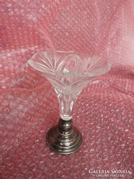 Crystal vase on a silver base