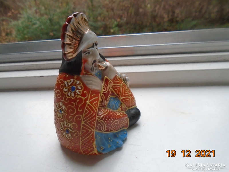 Indian tribal chief with decorative dress, feathers, peace pipe, Japanese satsuma porcelain