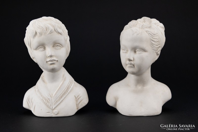 Porcelain girl and boy statue