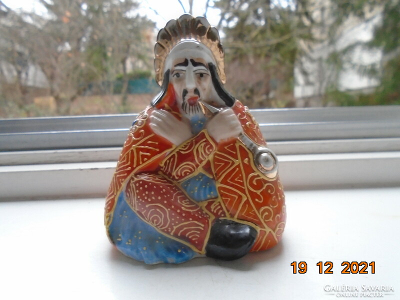 Indian tribal chief with decorative dress, feathers, peace pipe, Japanese satsuma porcelain