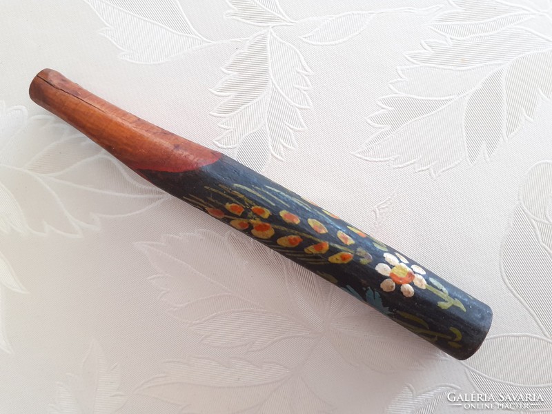 Old folk wooden snipe hand-crafted pipe with a painted flower motif