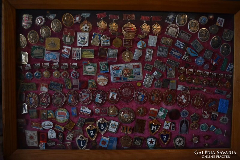 Collection of Soviet and Hungarian awards and badges in 15 glass panels
