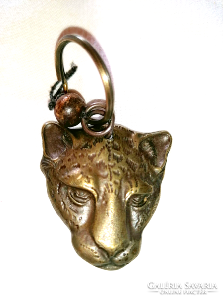 Bronze leopard head whistle 64.