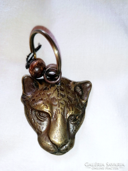 Bronze leopard head whistle 64.