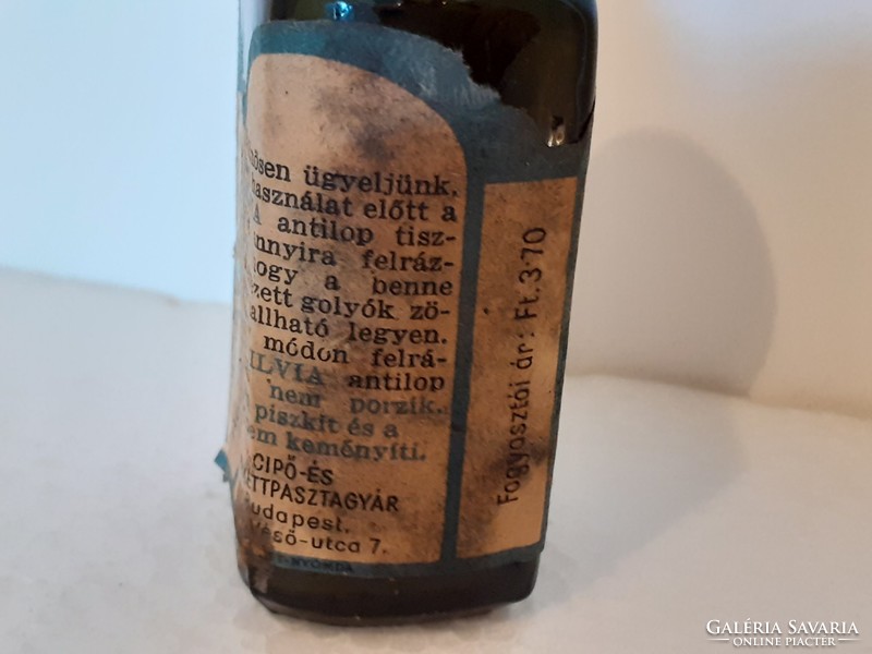 Old chemical bottle labeled silvia shoe polish bottle