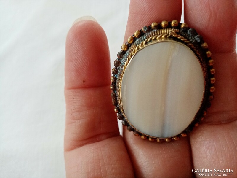 Old mother-of-pearl brooch pin