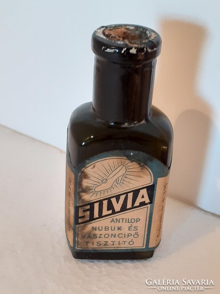 Old chemical bottle labeled silvia shoe polish bottle