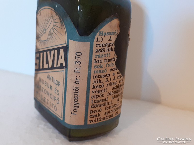 Old chemical bottle labeled silvia shoe polish bottle
