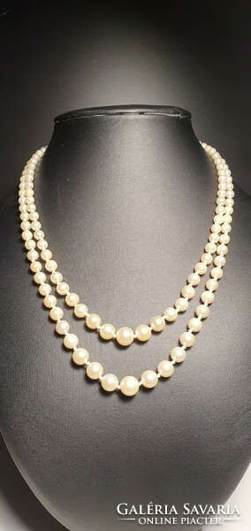 Double row of akoya pearls with gold clasp