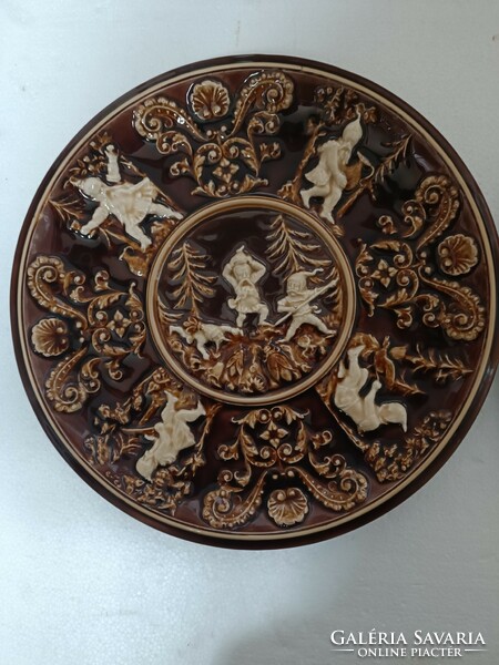 Antique schütz cilli eclectic wall plate with a pair of dwarfs