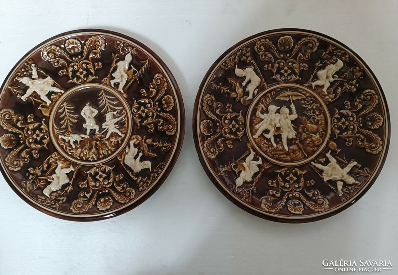Antique schütz cilli eclectic wall plate with a pair of dwarfs