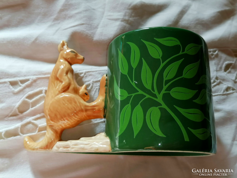 Rare ceramic cocoa mug with special glazed kangaroo tongs.