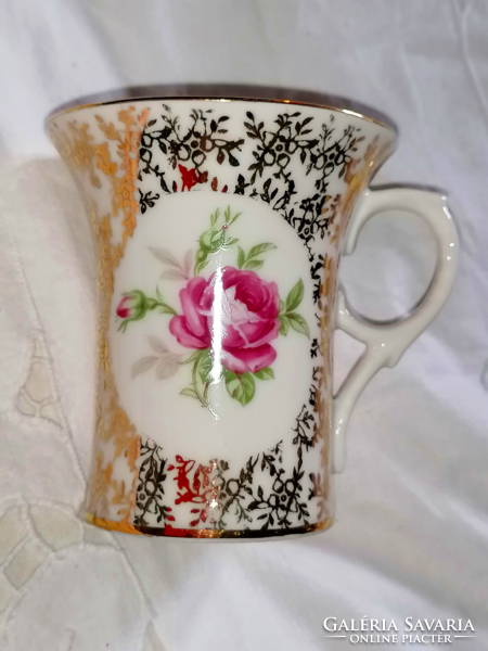 Pink, elegant, gold-plated cocoa mug