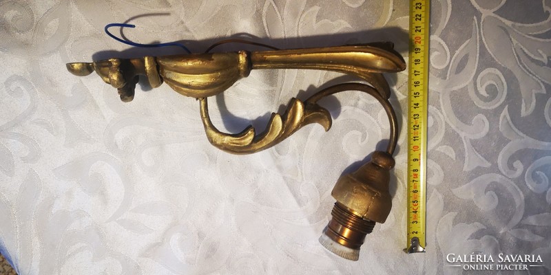 Antique at least 100-year-old wall arm wall lamp made of wood, gilded