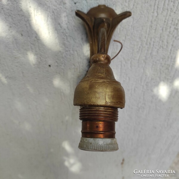 Antique at least 100-year-old wall arm wall lamp made of wood, gilded