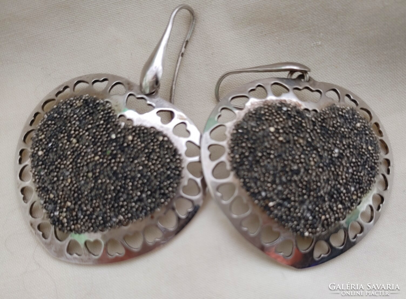 Large heart-shaped silver earrings!