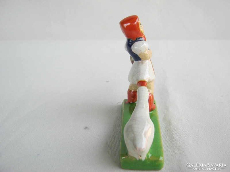 Folk ceramic girl with a goose
