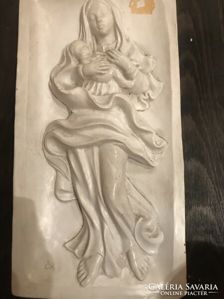 Terracotta wall picture, the small cover is of a relief virgin