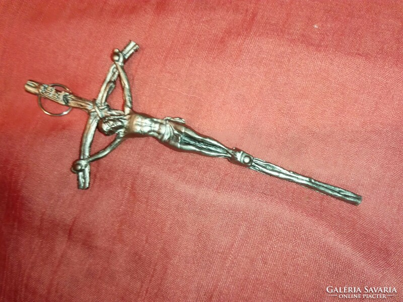 Antique small crucifix cast from lead.
