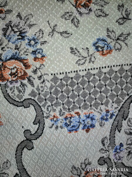 Old woven tablecloth, wall protector