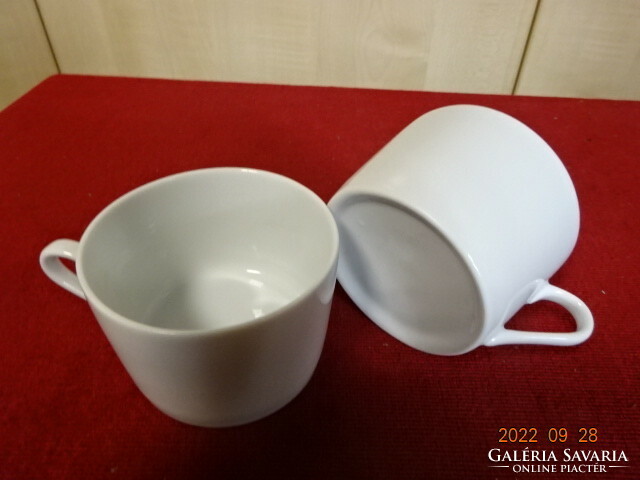 White porcelain coffee cup, two pieces in one. He has! Jokai.