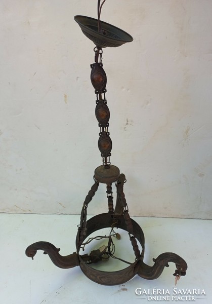 Two chandeliers in antique found condition. Teak and metal