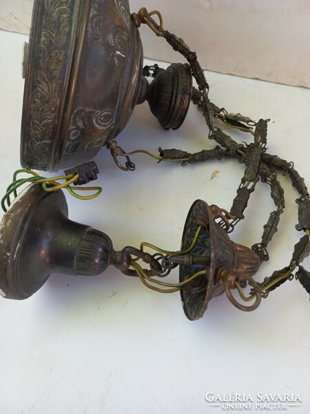 Two chandeliers in antique found condition. Teak and metal