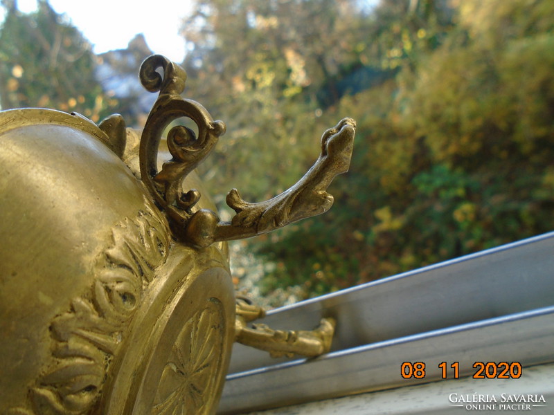 18 S rococo plastic putto with face, fire-gilded bronze bowl, with decorative tongs, on goat legs