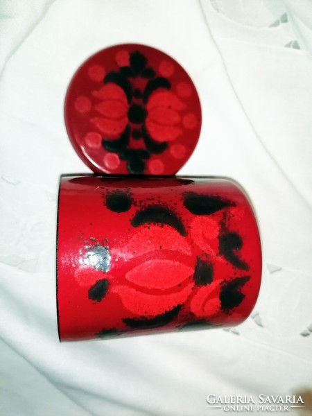 Glass box painted with a red folk pattern