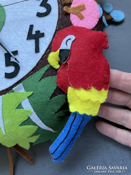 Unique handmade felt clock in a circle with colorful animals