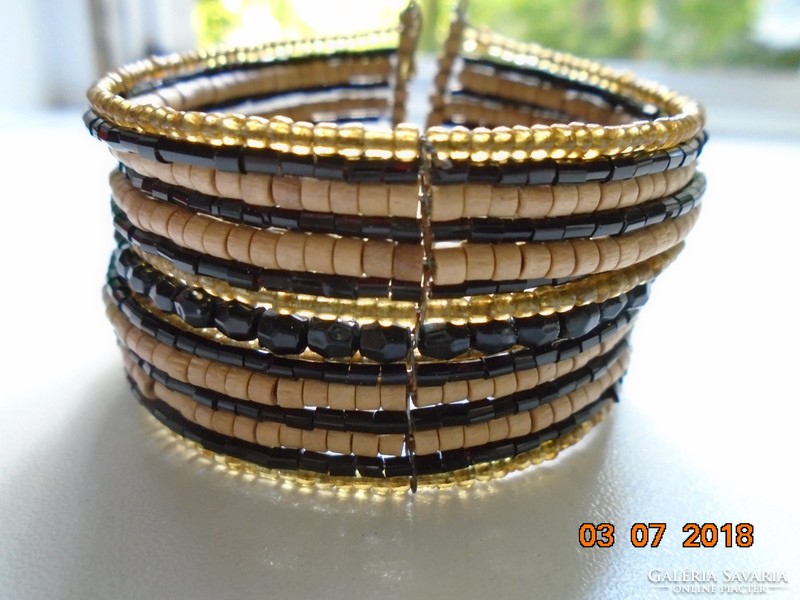 Moroccan 15-row wide handmade bracelet made of small polished stone, wood and glass beads