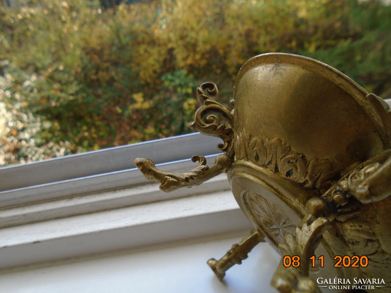 18 S rococo plastic putto with face, fire-gilded bronze bowl, with decorative tongs, on goat legs