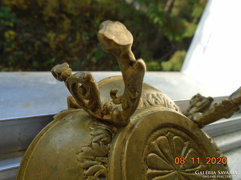 18 S rococo plastic putto with face, fire-gilded bronze bowl, with decorative tongs, on goat legs