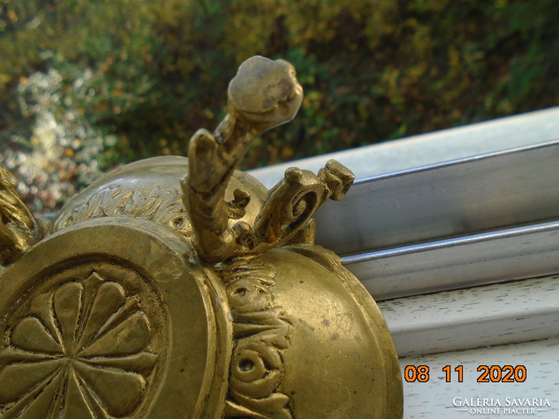 18 S rococo plastic putto with face, fire-gilded bronze bowl, with decorative tongs, on goat legs