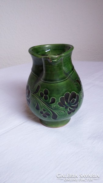 Old glazed folk ceramic small jug